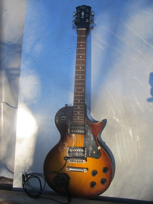 Электрогитара Les Paul Лес Пол с факелом.