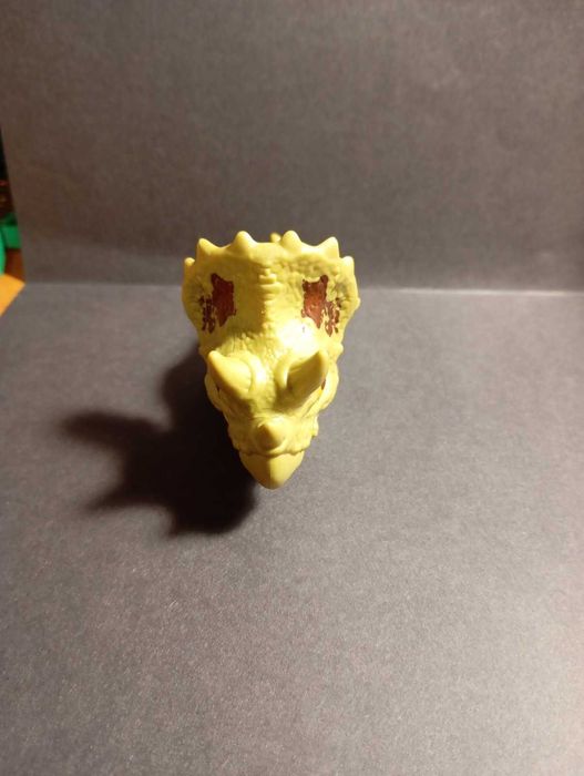 іграшка динозаврин