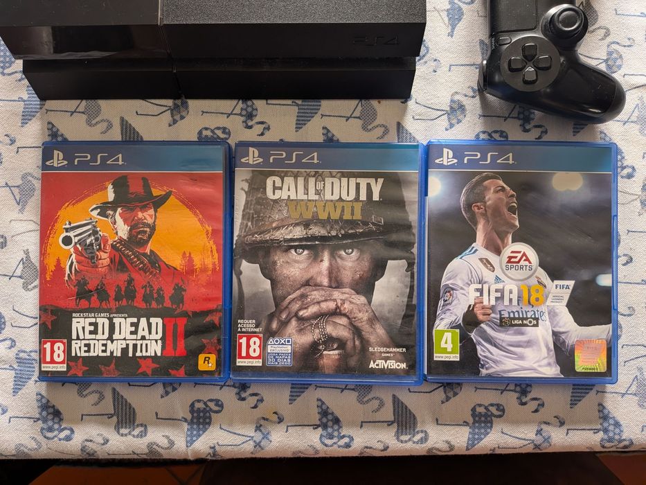 PS4 1TB + 2 comandos + 3 jogos