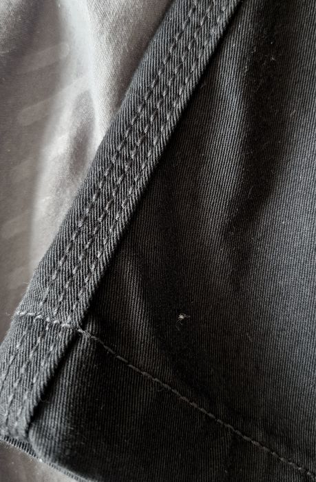 Calças de trabalho novas a estrear multibolsos em preto e cinza 
Elást