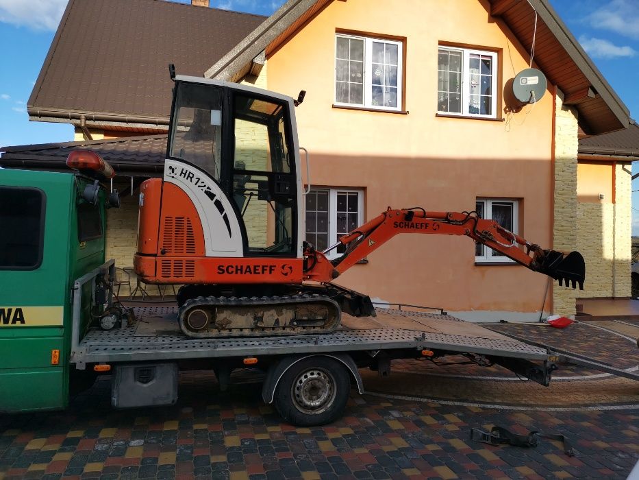 dachy ciesielst pokrycia budowa domów kostka brukowa elewacje wyburzen