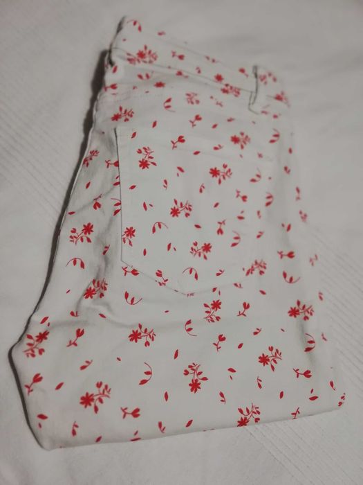 Spodnie stretch białe w kwiaty r. 36/38