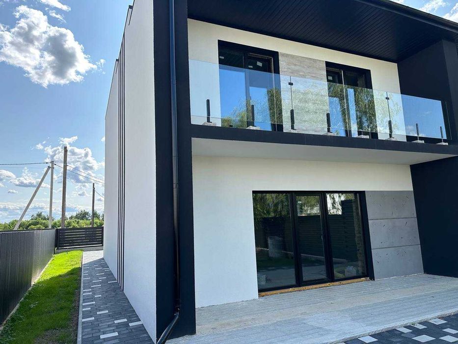 ПРЕМІУМ ЯКІСТЬ Дуплекс 135м2 з гаражем 5 сот землі, міські комунікації