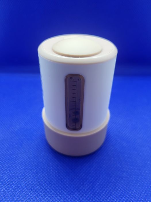 Elektroniczny aplikator do masażu skóry głowy z pojemnikiem na olejek