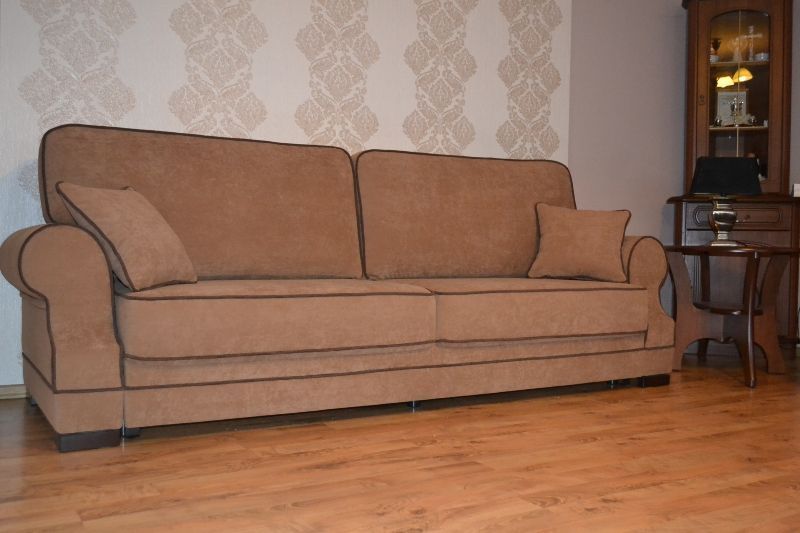 Zestaw wypoczynkowy Kanapa rozkładana + fotel Uszak + pufa - producent