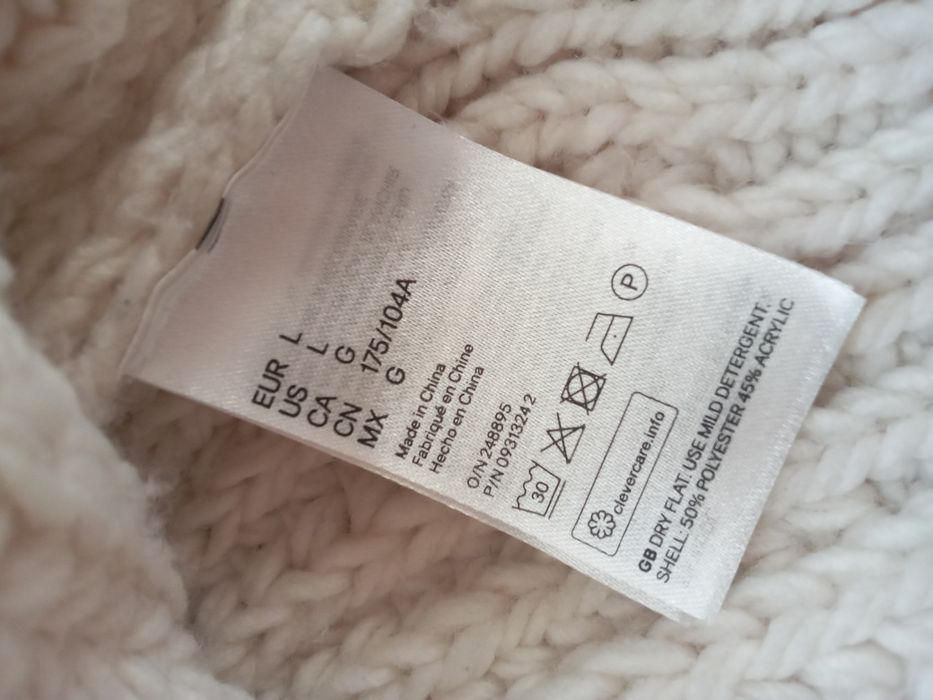 H&M Owersizowy śmietankowy sweter bez rękawów oversize r.L