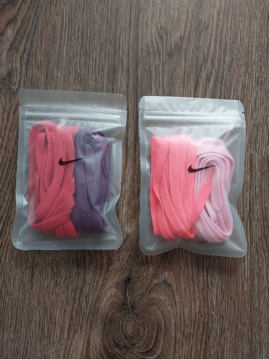 Шнурки  NIKE  рожевого кольору