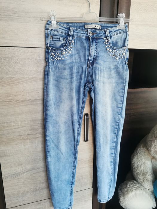 Spodnie jeansy jasne push up