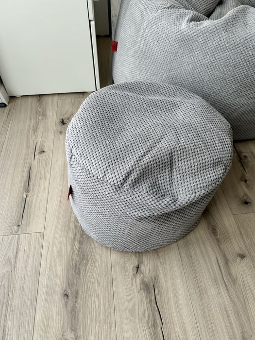 Szary fotel typu big bag + pufa