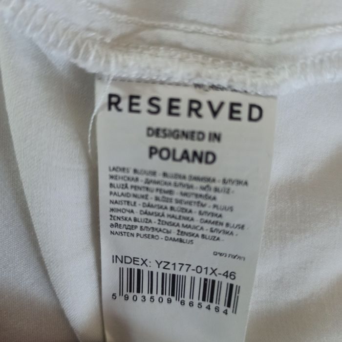 Biała bluzka Reserved z wiązaniem na przodzie