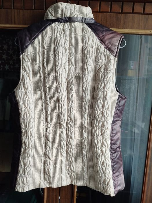 Жіночі теплі жилети б/у