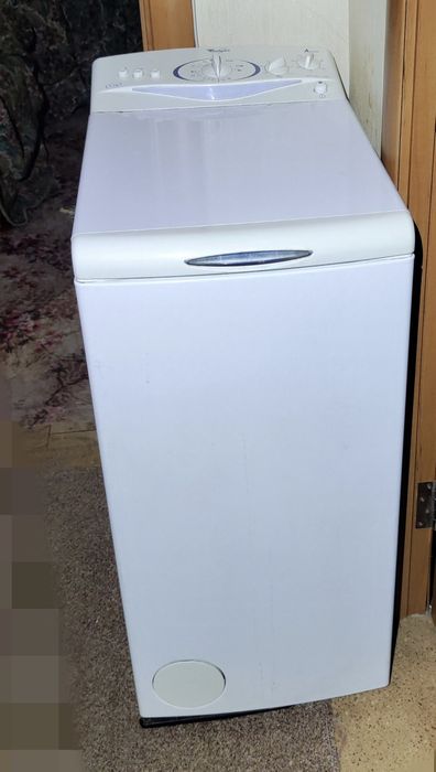 Стиральная машинка Whirpool,вертикальная загрузка 5 кг.