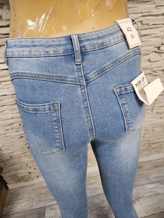 Nowe z metką przepiękne spodnie jeansowe w serduszkami Only one day ro