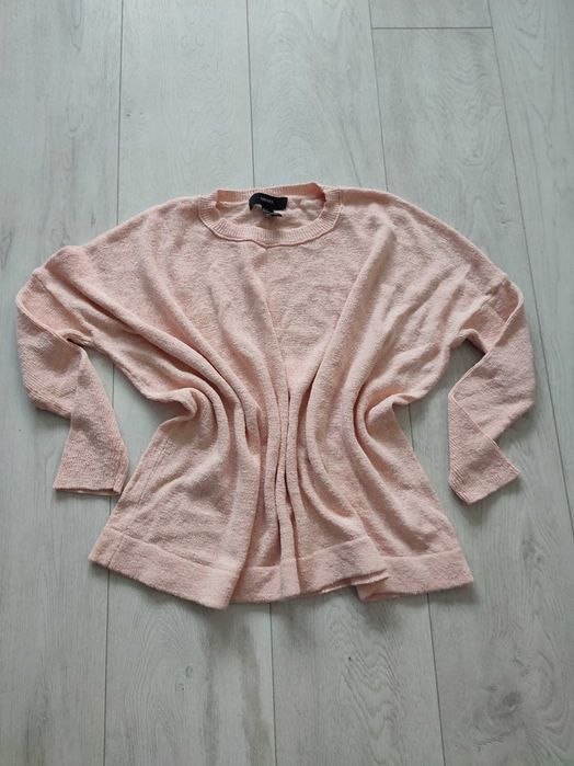 Brzoskwiniowy sweter oversize