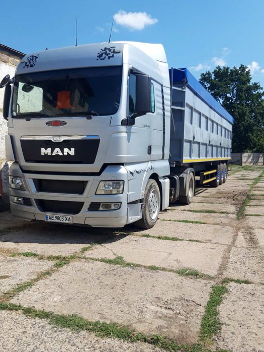 Тягач MAN TGX 18.480 2013 року самосвал . та 2 причепа schmitz   зерновози