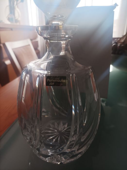 Garrafa de cristal e prata