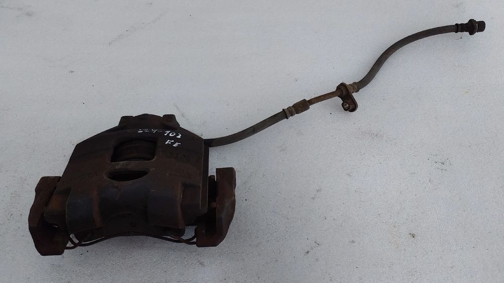 Pinça travão / maxila de travão frente esquerda TOYOTA Auris Hatchback