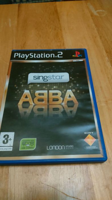 Pack SingStar PS2 — 4 jogos + 2 microfones USB