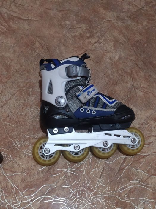 Роликовые коньки