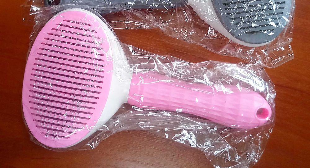 Щітка пуходерка для котів та собак