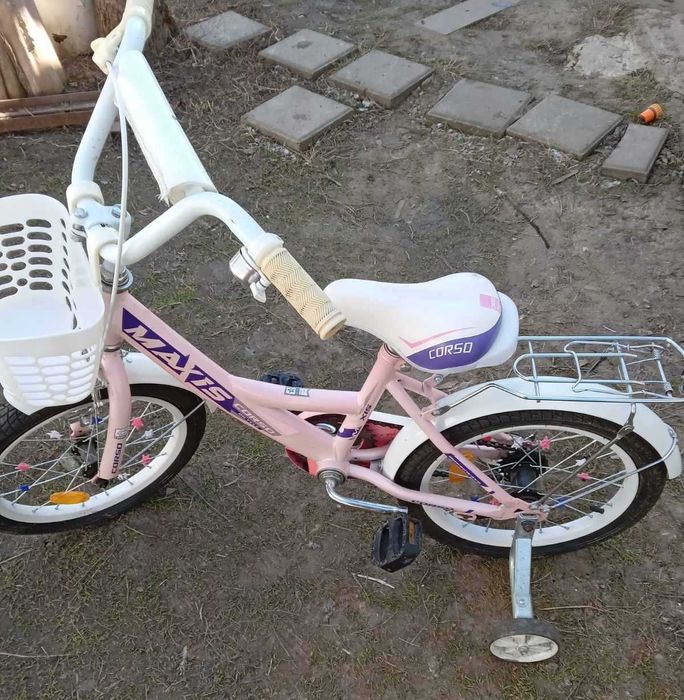 Велосипед для дівчинки на 5-9 років. Дуже зручний додаткові колеса.