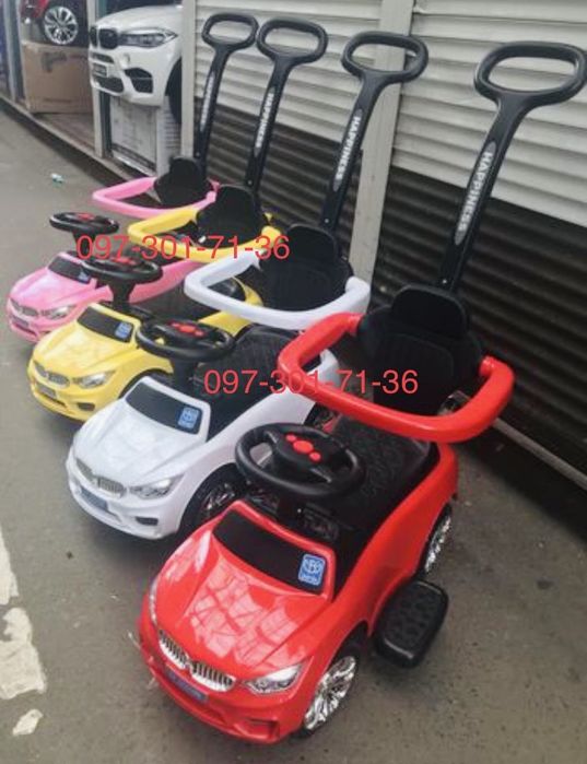 Толокар с ручкой поворотной БМВ музыка и свет, скидка!!!