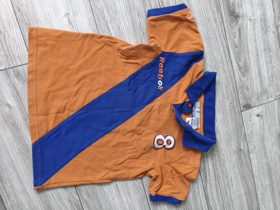 Pomarańczowa bluzka Reebok 122