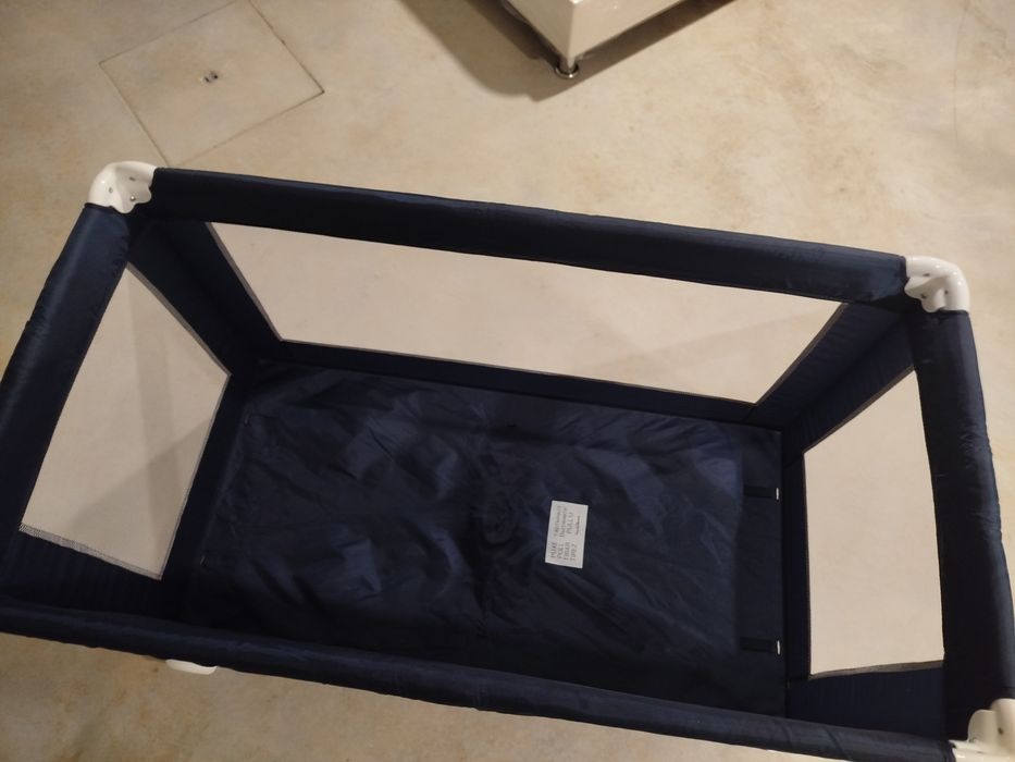 Cama de viagem e colchão