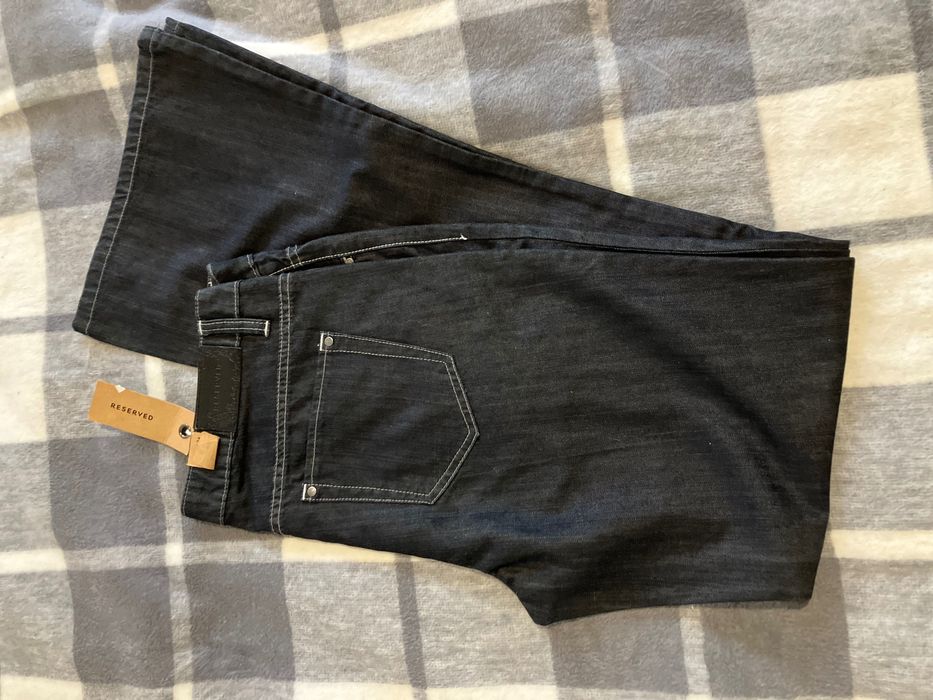 Spodnie dzwony Reserved