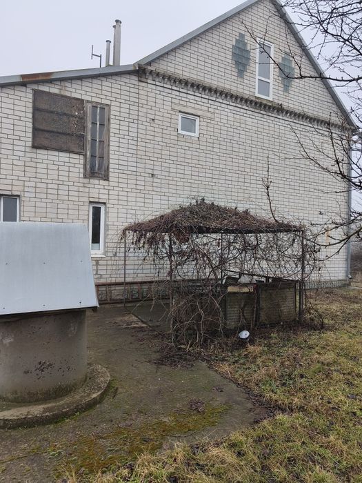 Продам  будинок  в Новомиколаївкі  з  неймовірним плануванням
