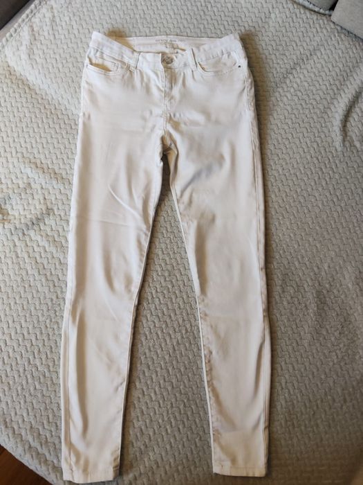 Białe jeansy damskie Orsay rozmiar 38