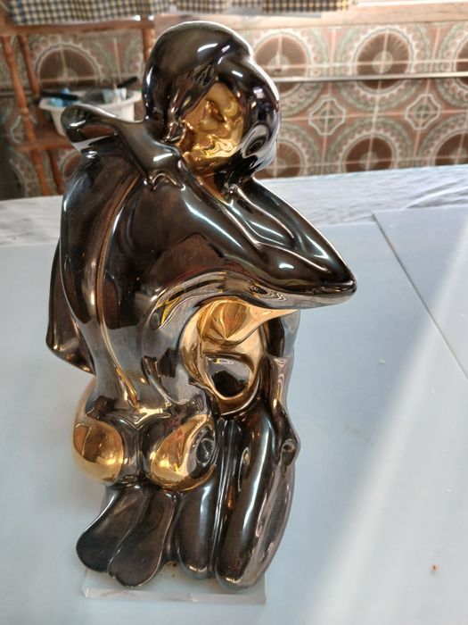 Estátua da marca GALOS