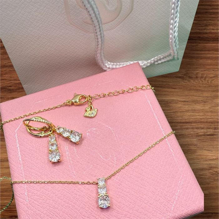 Сережки  та кулон Swarovski