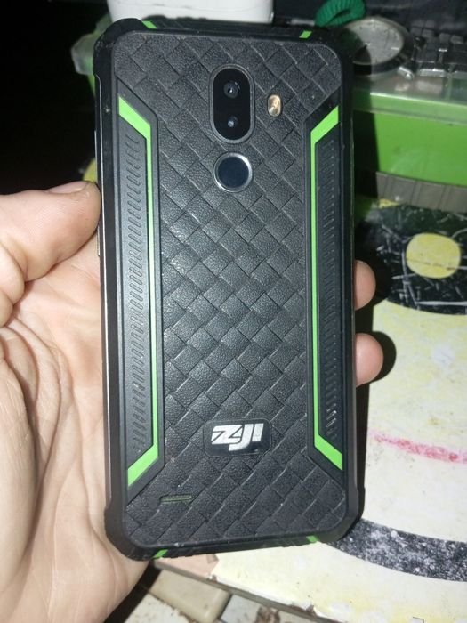 ZOJI Homtom Z33 green!Под замену АКБ !Экран целый!