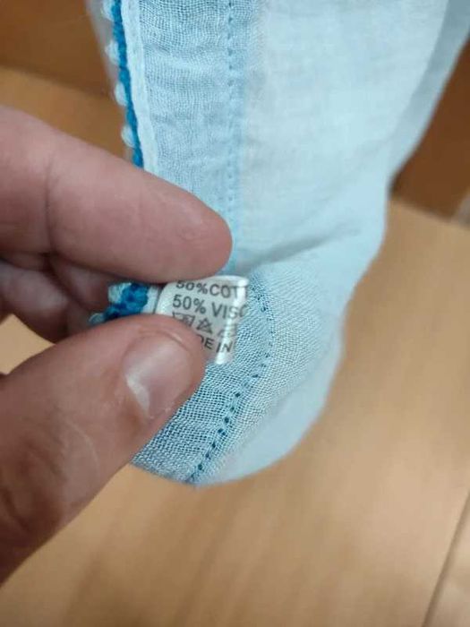 cachecol ou echarpe de um tom de azul claro