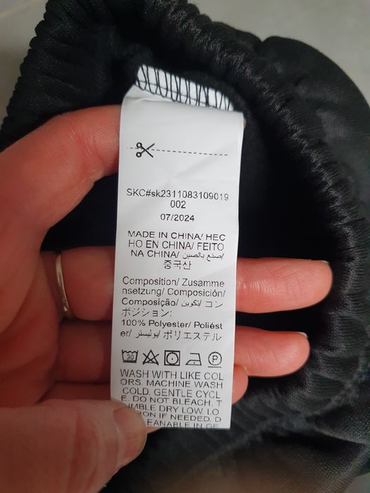 Czarne spodnie dresowe roz. 134 Shein