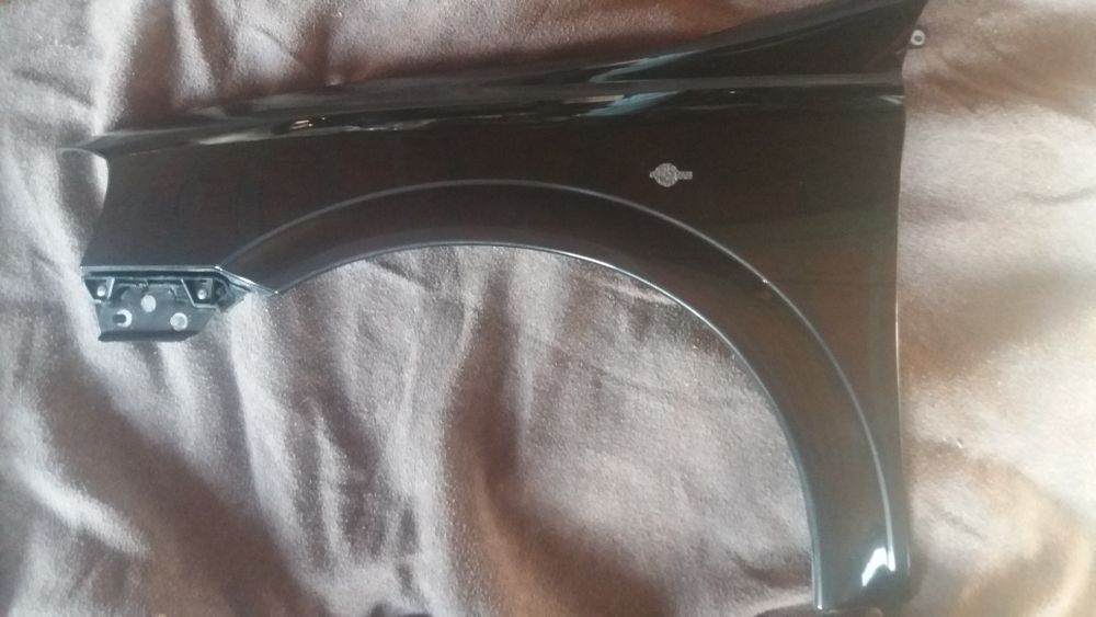 Guarda lamas esquerdo Opel astra G