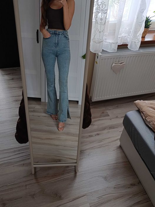 Spodnie jeansowe wysoki stan dzwony rozcięcia spodnie jeansowe