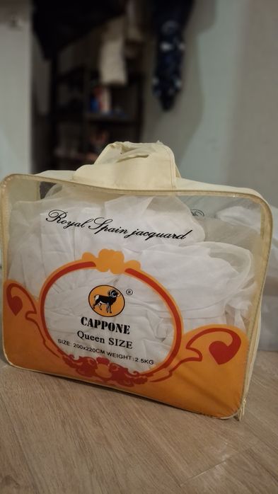 Тюль белая шифоновая.