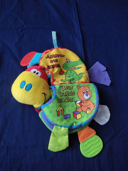 Развивающая игрушка - грызунок в форме коровы.