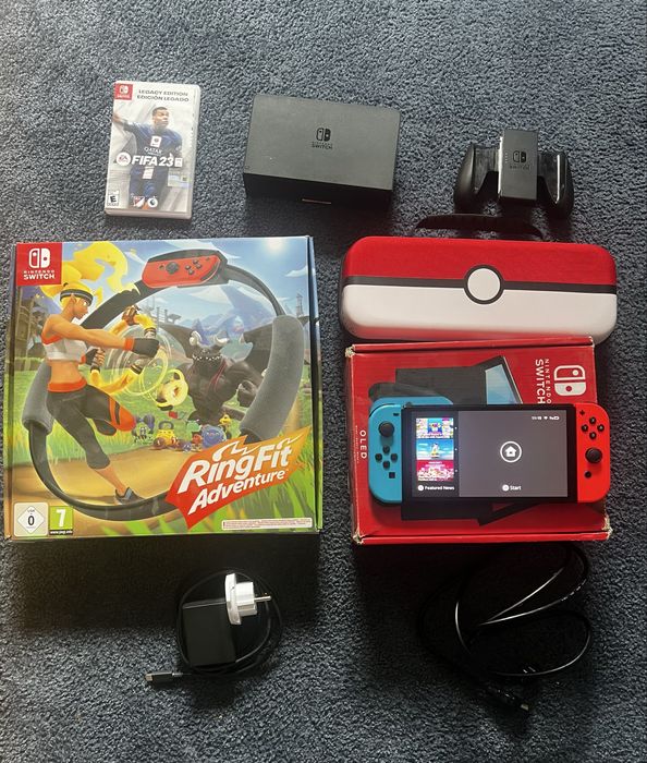 ⸻  Nintendo Switch OLED + Ring Fit Adventure + FIFA 23 + Etui
