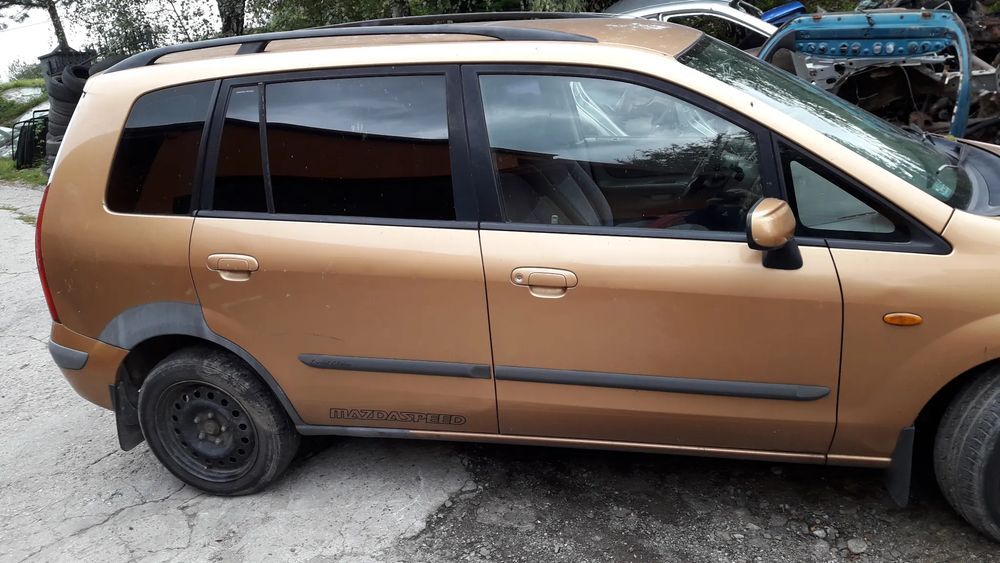 mazda 323  323f bj  premacy kielich przód przedni mocowanie nadkole