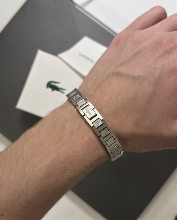 Браслет Lacoste в упаковці. Довжина 21 см.