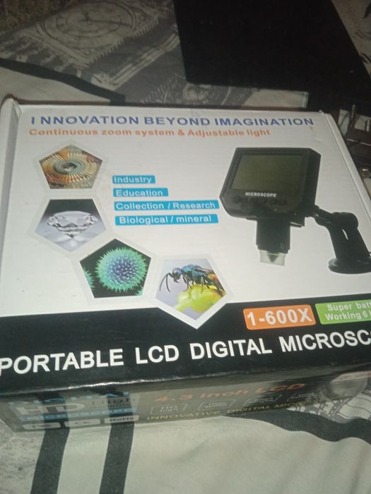 Електронний мікроскоп з підставкою