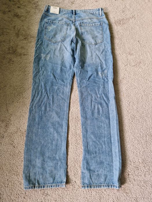 Jeansy cropp z motylkami