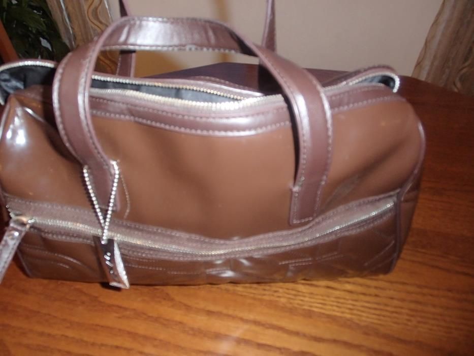 Mala de marca em muito bom estado