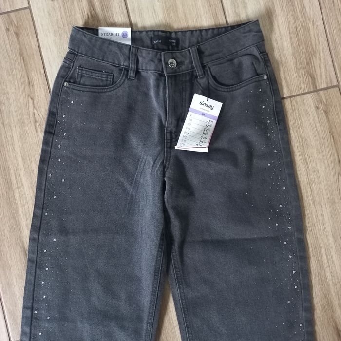 Damskie spodnie jeans  z szerokimi nogawkami-M