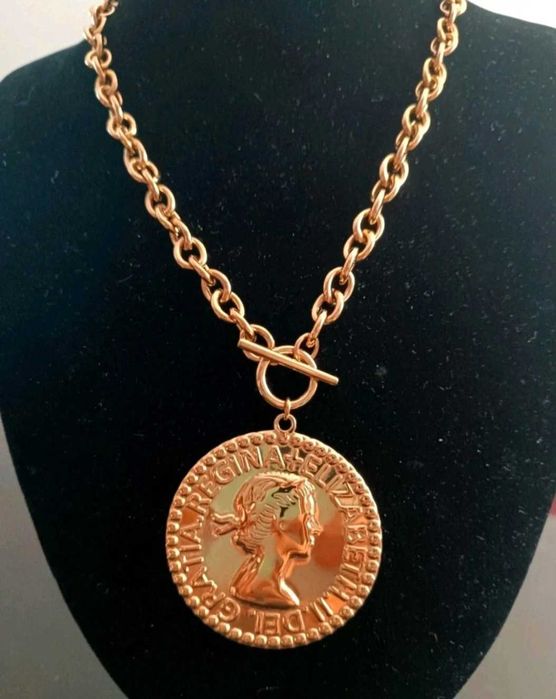 Colar da medalha grande.