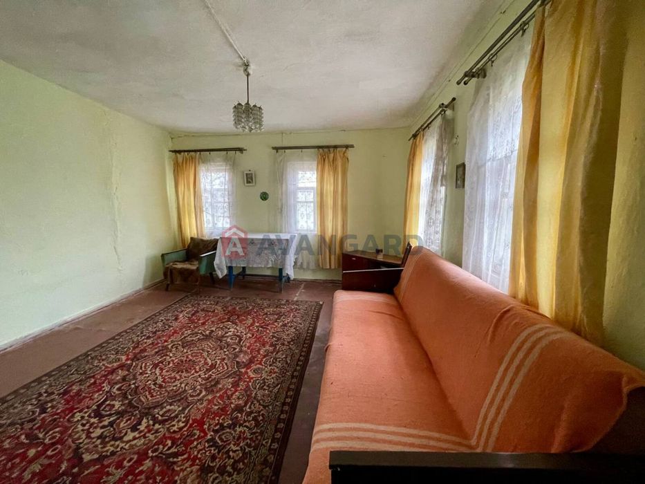 Ділянка 25 сотих з будинком в с. Худяки