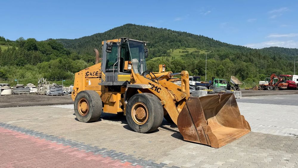 Case 721C  Ładowarka Volvo Komatsu Liebherr